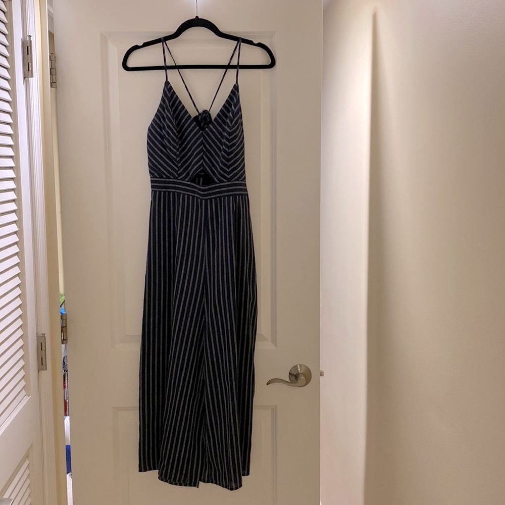 Blue and white stripped romper. Size Medium.
